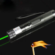 burning match green laser